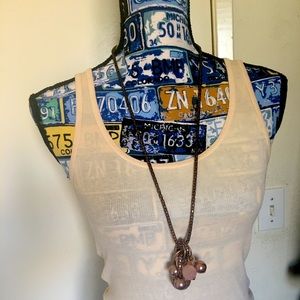 Beautiful copper colored decorative ball necklace